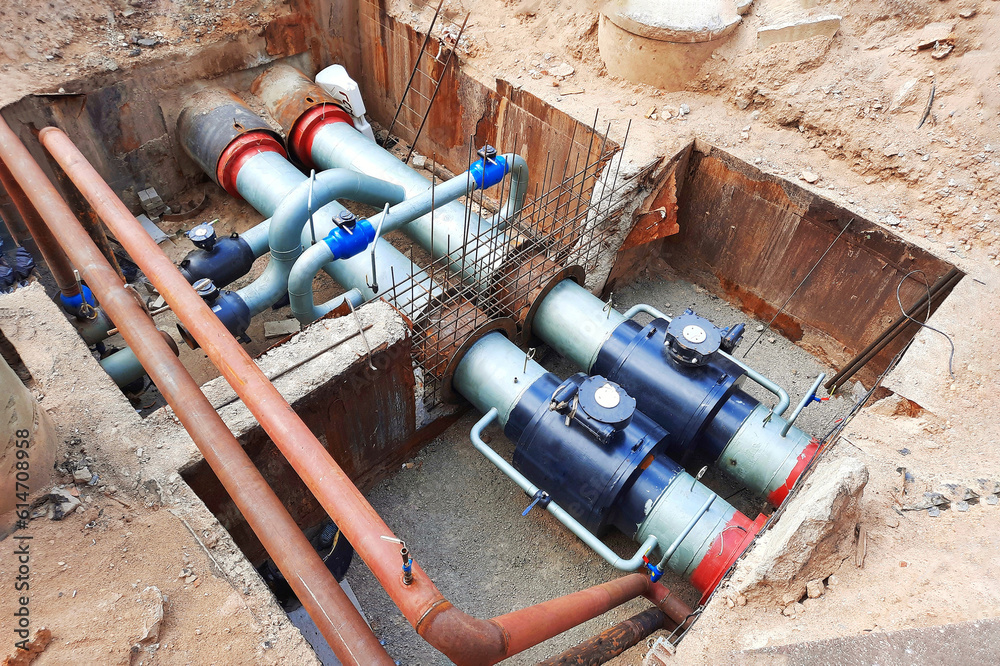 Pipe replacement. Installing PVC pipe conduit running through trench