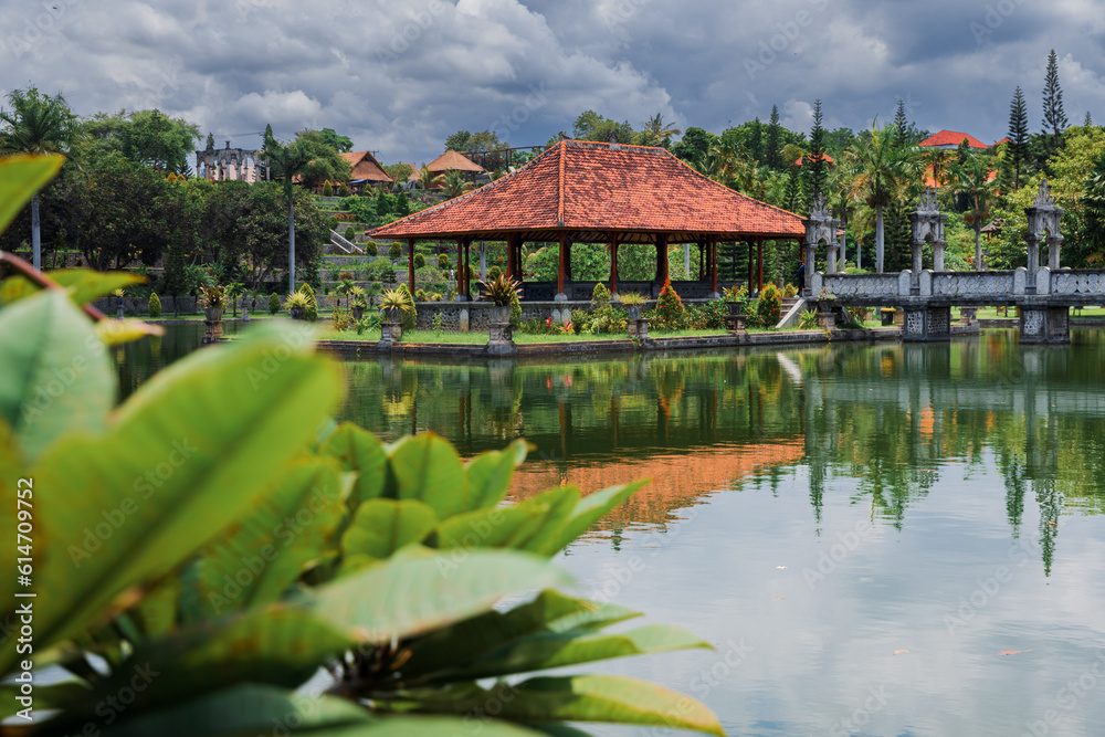 Naklejka premium Taman Ujung in Bali, Indonesia. Balinese architecture with lake