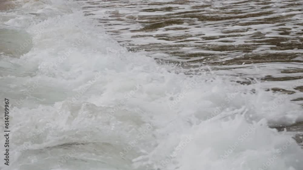 Rough Waves Rushing Over Foamy Surface In Con Dao Island, Vietnam. Close Up Rough Waves Rushing Over Foamy Surface In Con Dao Island, Vietnam. Close Up