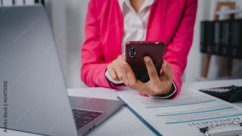 Fototapeta premium Excited Asian bookkeepers doing bookkeeping, accounts payable, assets, book value, equity, inventory, liabilities, cost of goods sold, depreciation, expenses, Gross profit, diversification, liquidity