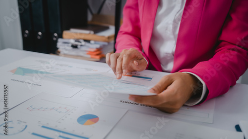 Excited Asian bookkeepers doing bookkeeping, accounts payable, assets, book value, equity, inventory, liabilities, cost of goods sold, depreciation, expenses, Gross profit, diversification, liquidity