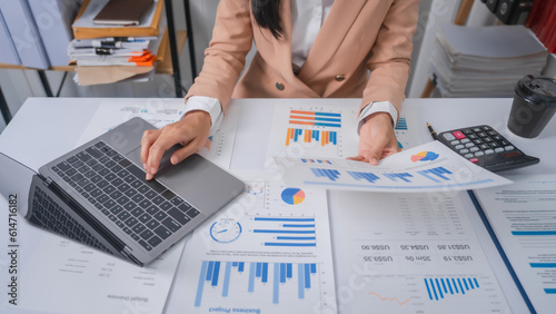 Photography Excited Asian bookkeepers doing bookkeeping, accounts payable, assets, book valu