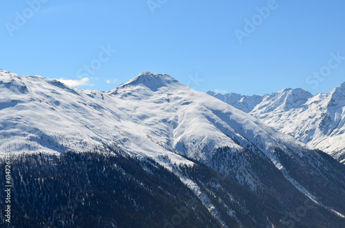 mountains, a village in a mountain valley, a resort