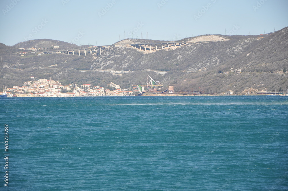 Panoramic view of Bakar city with rough Adriatic sea in Croatia.Rough Adriatic Sea and Bura wind in Bakar gulf.