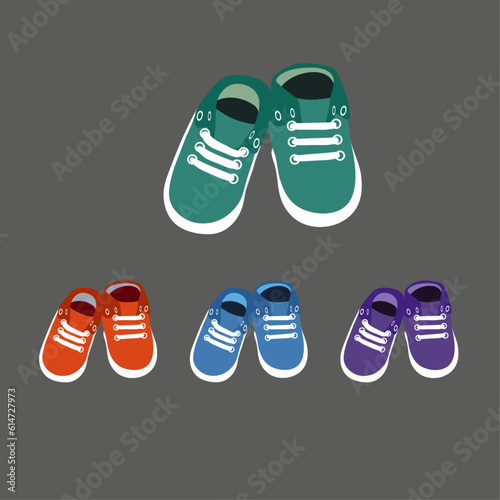 Children's slippers in different colors: green, red, blue and purple © Valeriya