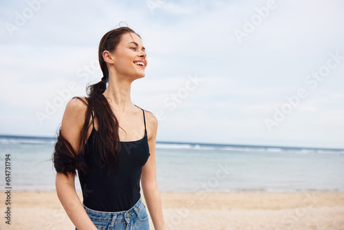 sea woman smile running beach travel young summer sunset leisure lifestyle