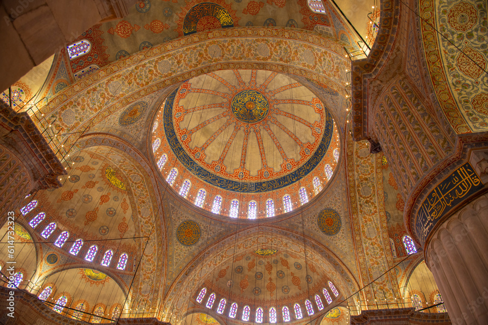 Blue Mosque Sultan Ahmet Camii dome ceiling in Sultanahmet in historic city of Istanbul, Turkey. Historic Areas of Istanbul is a UNESCO World Heritage Site.