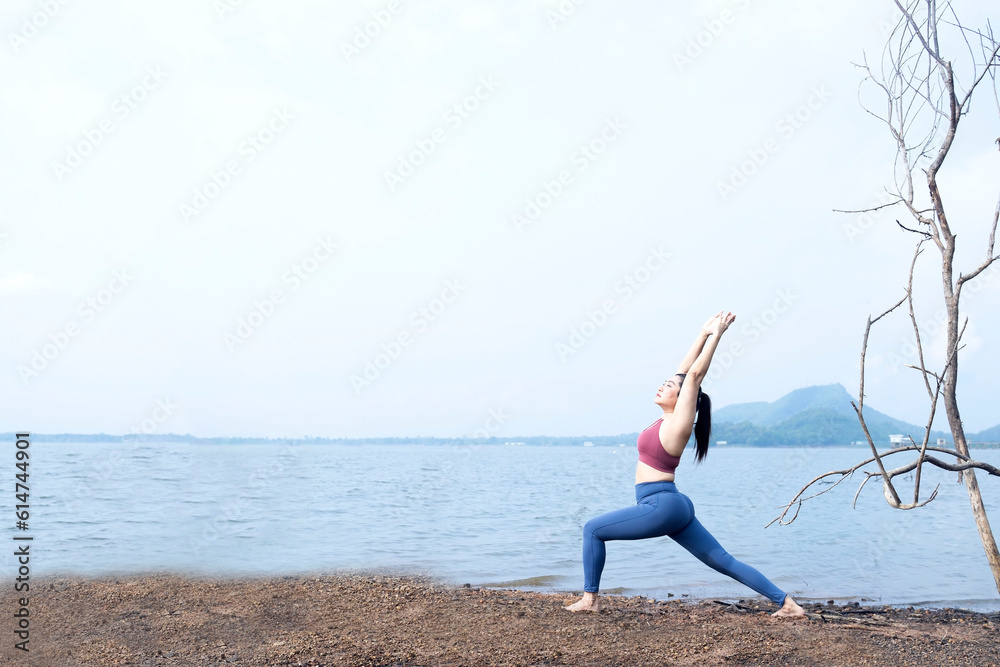 The asian woman do yoga in holiday time, on modern concept and healthy. Nature background with exercise and nature, female happiness concept The asian woman do yoga in holiday time, on modern concept and healthy. Nature background with exercise and nature, female happiness concept
