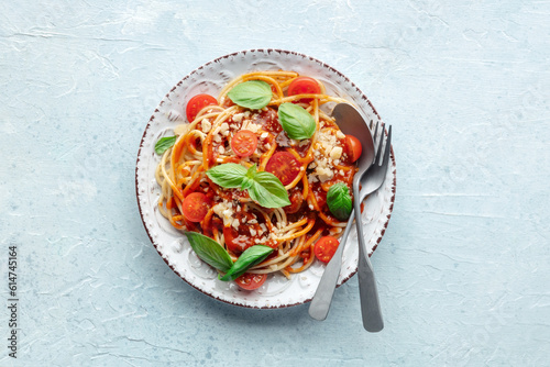 Wallpaper Mural Spaghetti marinara, pasta with tomato sauce and basil, overhead flat lay shot on a slate background Torontodigital.ca