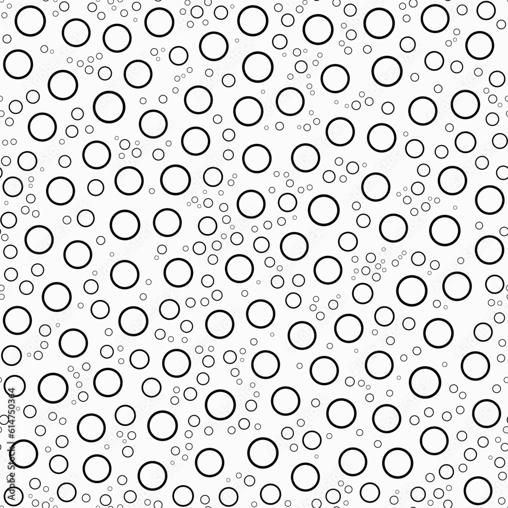 Seamless pattern of different-sized dots, black and white.