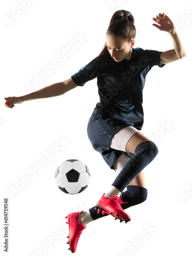 Young female soccer or football player in sportwear and boots kicking ball for the goal in jump isolated on transparent background. Concept of professional sport, competition, hobby, action and motion © master1305