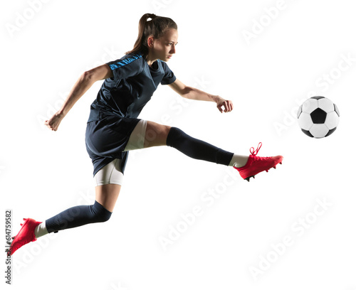 Young sportive woman, professional football, soccer player in motion, kicking ball isolated on transparent background. Concept of professional sport, competition, hobby, action and motion © master1305