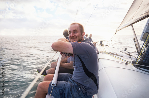Portrait smiling man sailing on sailboat © KOTO