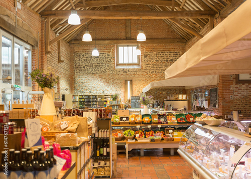 Market with brick walls and wood beam vaulted ceiling