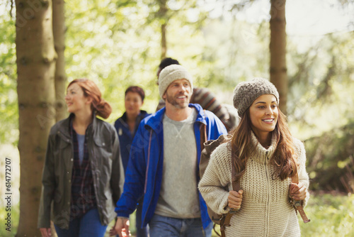 Friends hiking in woods