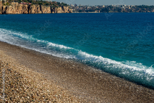 Sea waves on a sand beach