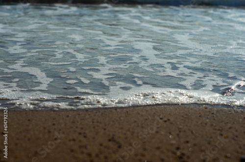 Sea waves on a sand beach