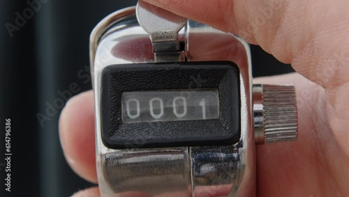 Hand held tally counter, counter clicker, counting machine . High quality 4k footage