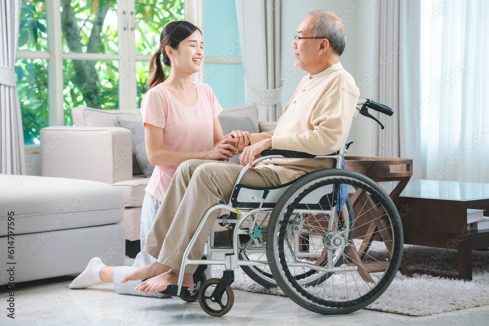 Asian family health care and insurance business at home concept, woman daughter take care support to senior elderly father patient in wheelchair together, dad having smile in happy love lifestyle Asian family health care and insurance business at home concept, woman daughter take care support to senior elderly father patient in wheelchair together, dad having smile in happy love lifestyle
