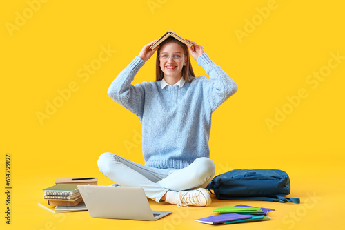 Female student with book st...