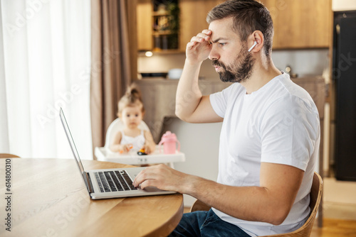 A remote worker is having troubles with project while babysitting his daughter.
