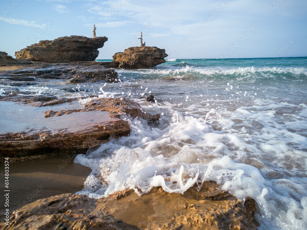 waves crashing on the beach