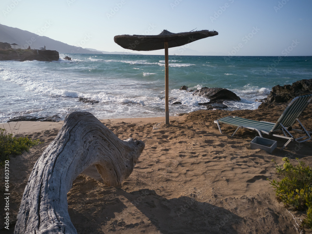 beach with umbrellas and chairs