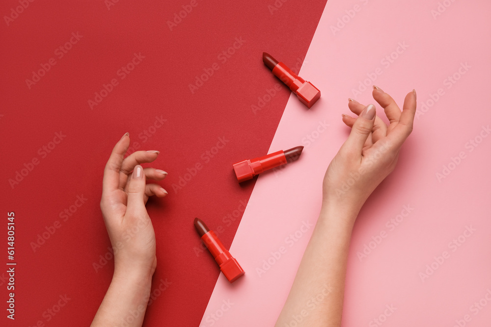 Woman with lipsticks on color background Woman with lipsticks on color background