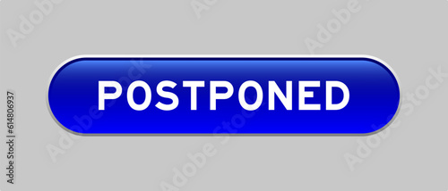Blue color capsule shape button with word postponed on gray background
