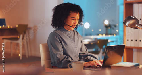 Laptop, customer service and remote work with a business black woman in her home at night for support. Contact us, smile and consulting with a happy female employee working at a desk in her house