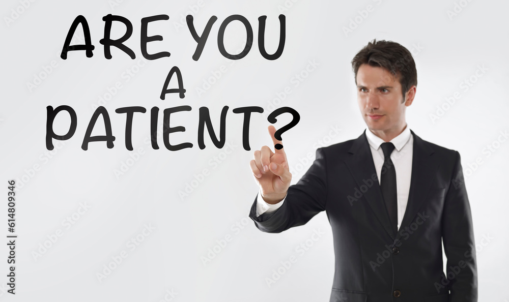Man touching on a touchscreen with “Are you a patient?” text
Man touching on a touchscreen with “Are you a patient?” text