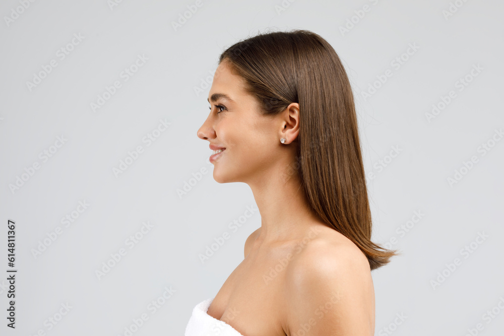 Profile portrait of european woman isolated on grey, beautiful lady demonstrating perfect face contours, copy space Profile portrait of european woman isolated on grey, beautiful lady demonstrating perfect face contours, copy space