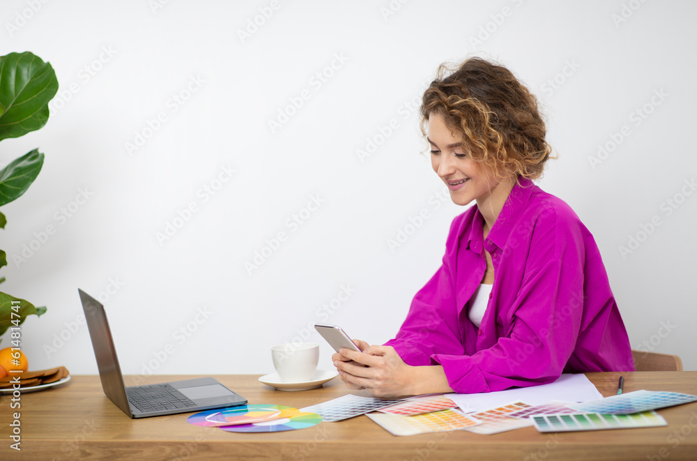 Freelance App. Smiling Young Designer Woman Using Smartphone At Home Office Freelance App. Smiling Young Designer Woman Using Smartphone At Home Office
