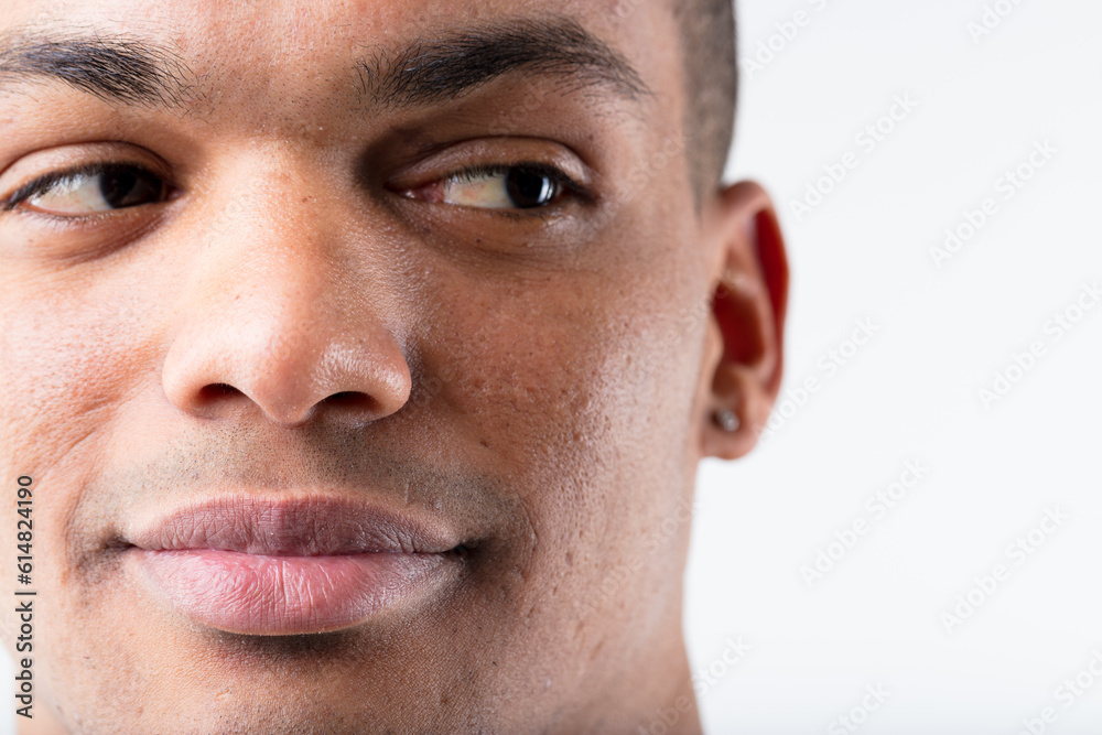 Fototapeta premium Black man's close-up, smile toward copyspace