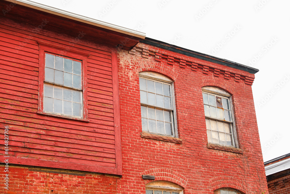 Brick buildings: icons of stability, progress, and community. Offices and apartment complexes symbolize growth, urban living, and shared aspirations