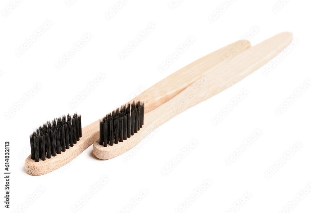 Bamboo toothbrushes on white background Bamboo toothbrushes on white background