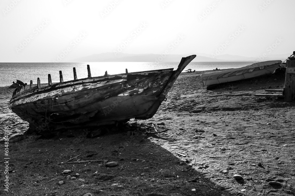 Old abandoned boat on the beach in Spain Old abandoned boat on the beach in Spain