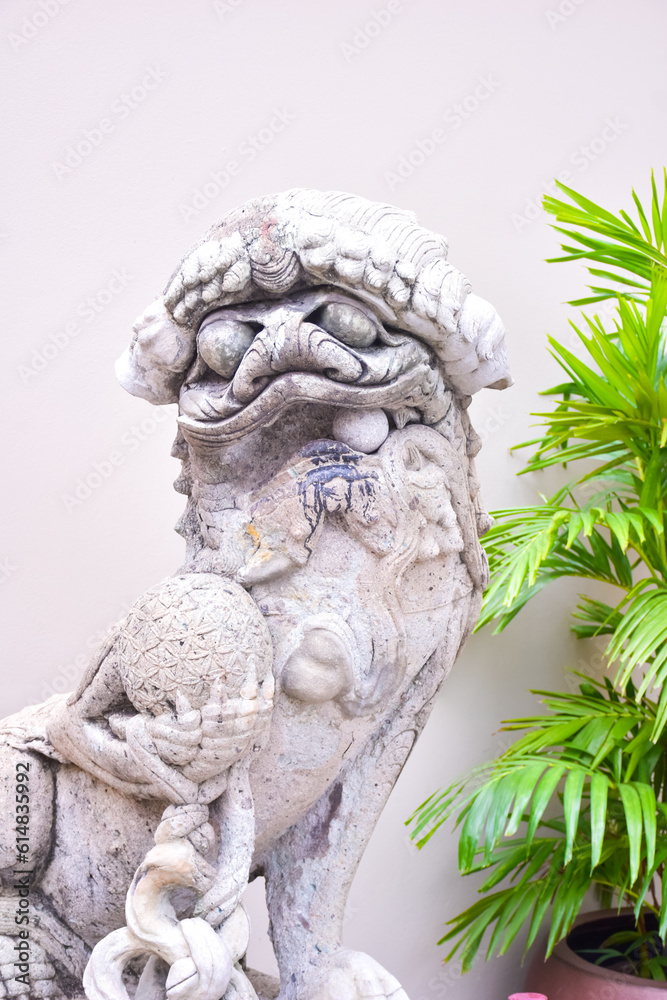 Singha statue Chinese guardian at the Emerald Buddha temple in Bangkok, Thailand . Singha statue Chinese guardian at the Emerald Buddha temple in Bangkok, Thailand .