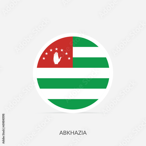 Abkhazia round flag icon with shadow.