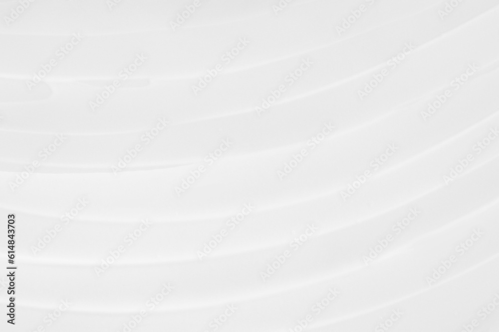Smeared white cosmetic cream all over the background. Smeared white cosmetic cream all over the background.