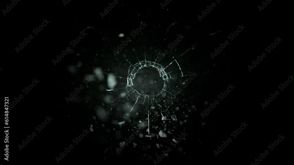 Super Slow Motion Shot of Real Bullet Glass Break Isolated on Black Background at 1000fps.