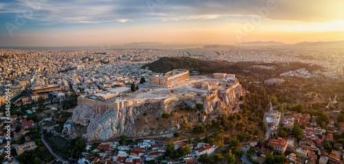 Panoramic aerial view of the skyline and Parthenon Temple at the Acropolis of Athens, Greece, during summer sunset time