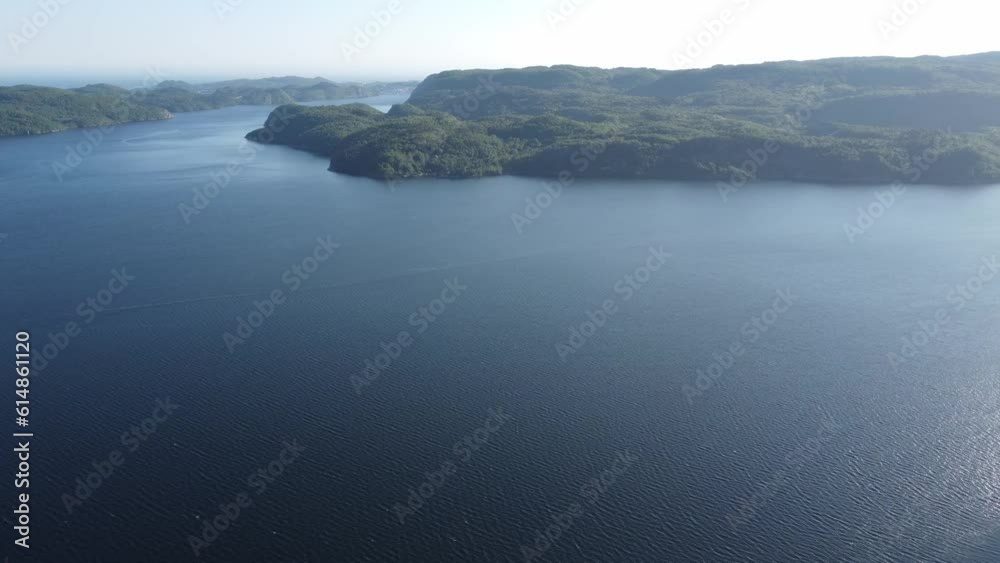 Majestic fjord with beautiful mountains in the background, drone footage. Southern Norway, Skrelia, Lyngdal Majestic fjord with beautiful mountains in the background, drone footage. Southern Norway, Skrelia, Lyngdal