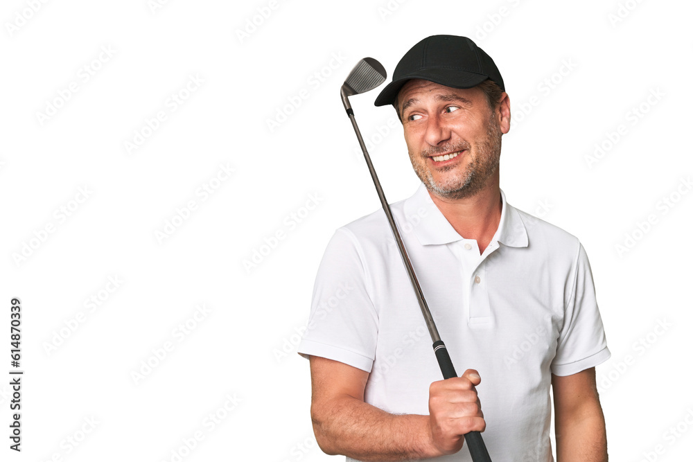Middle aged golfer man looks aside smiling, cheerful and pleasant. Middle aged golfer man looks aside smiling, cheerful and pleasant.