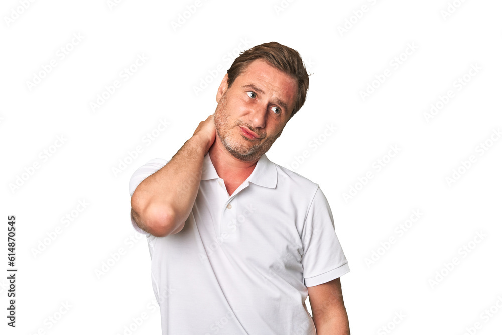 A middle-aged man isolated touching back of head, thinking and making a choice. A middle-aged man isolated touching back of head, thinking and making a choice.