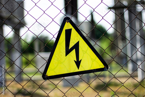 danger warning sign on a fence