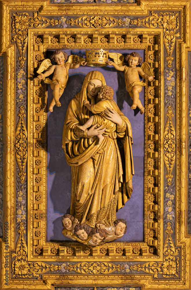 NAPLES, ITALY - APRIL 20, 2023: The statue of Madonna from coffered ceiling of  Basilica santuario di Santa Maria del Carmine Maggiore by Mario Coraiola (1955) as the copy of original from 16. cent.