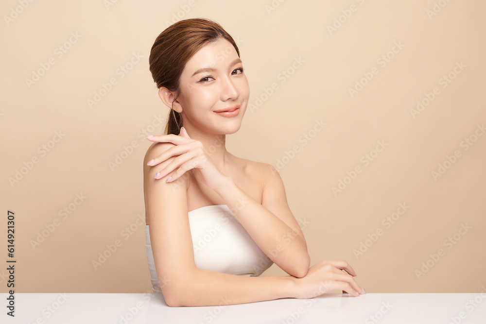 Beautiful young asian woman with clean fresh skin on beige background, Face care, Facial treatment, Cosmetology, beauty and spa, Asian women portrait. Beautiful young asian woman with clean fresh skin on beige background, Face care, Facial treatment, Cosmetology, beauty and spa, Asian women portrait.