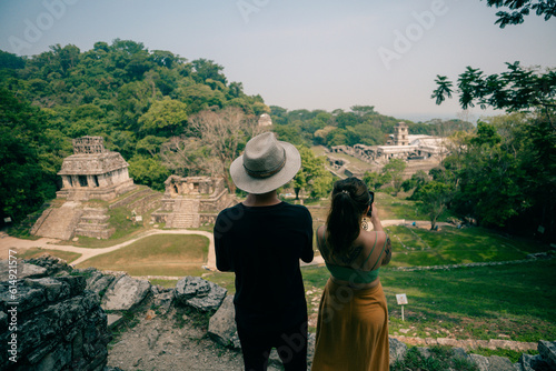 couple in Mayan ruins in Palenque, Chiapas, Mexico - may 2023 photo