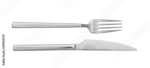 Knife and fork isolated on white, top view. Stylish shiny cutlery set photo